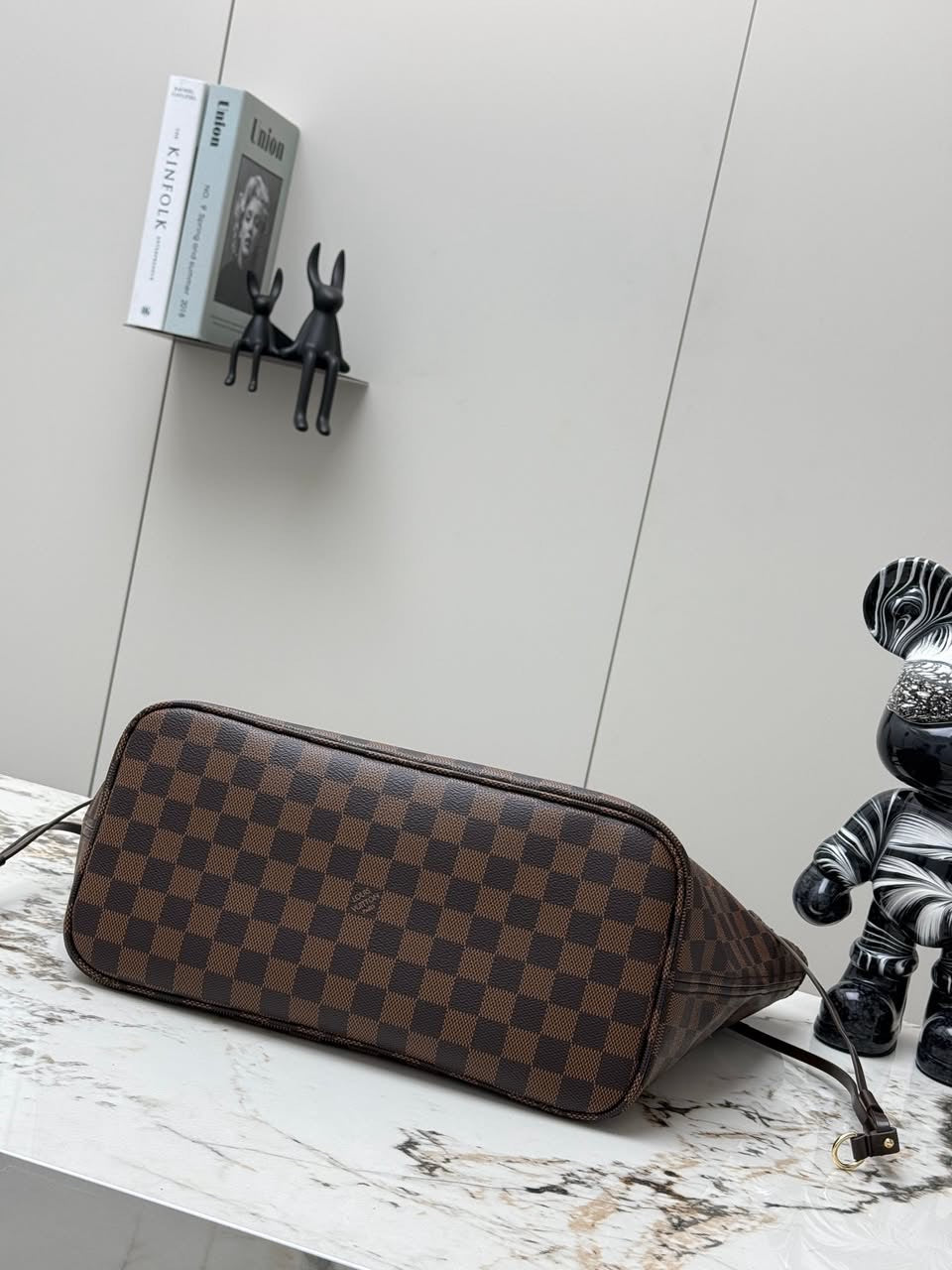 LV brown handbag with pink inside
