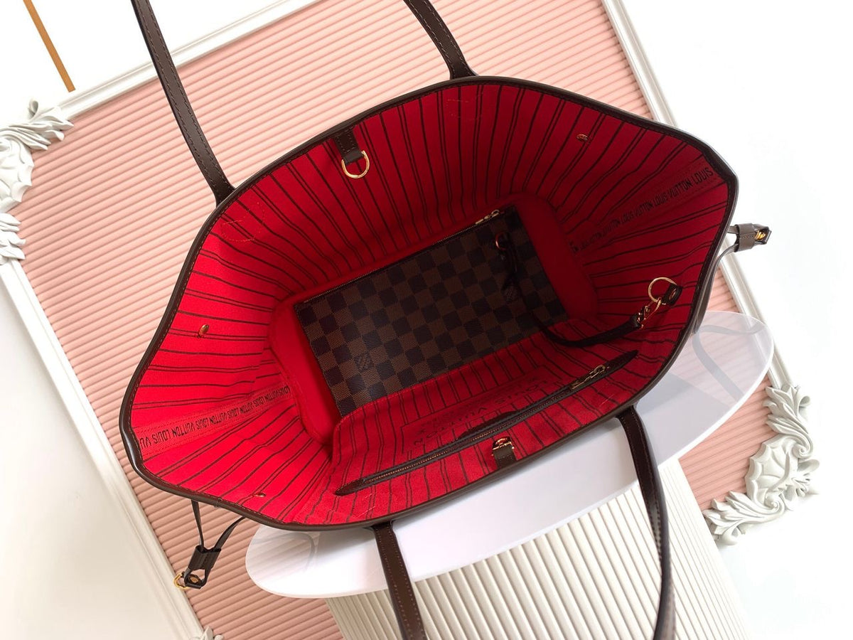 LV brown handbag with red inside