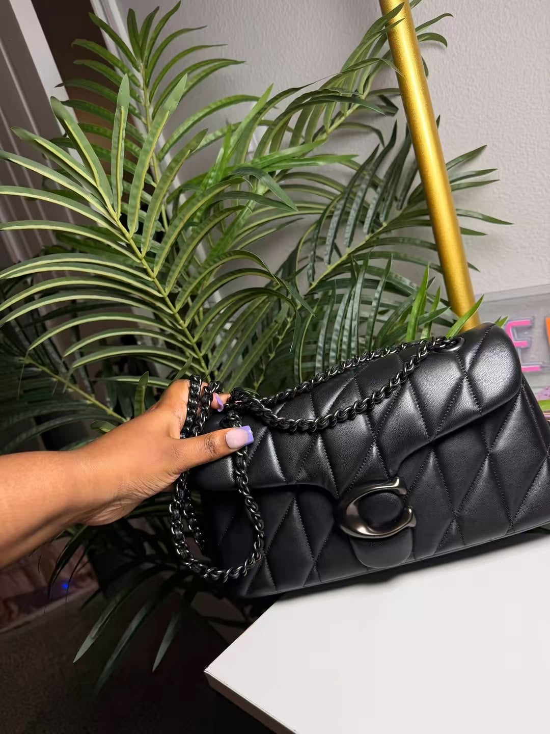 All black Coach purse