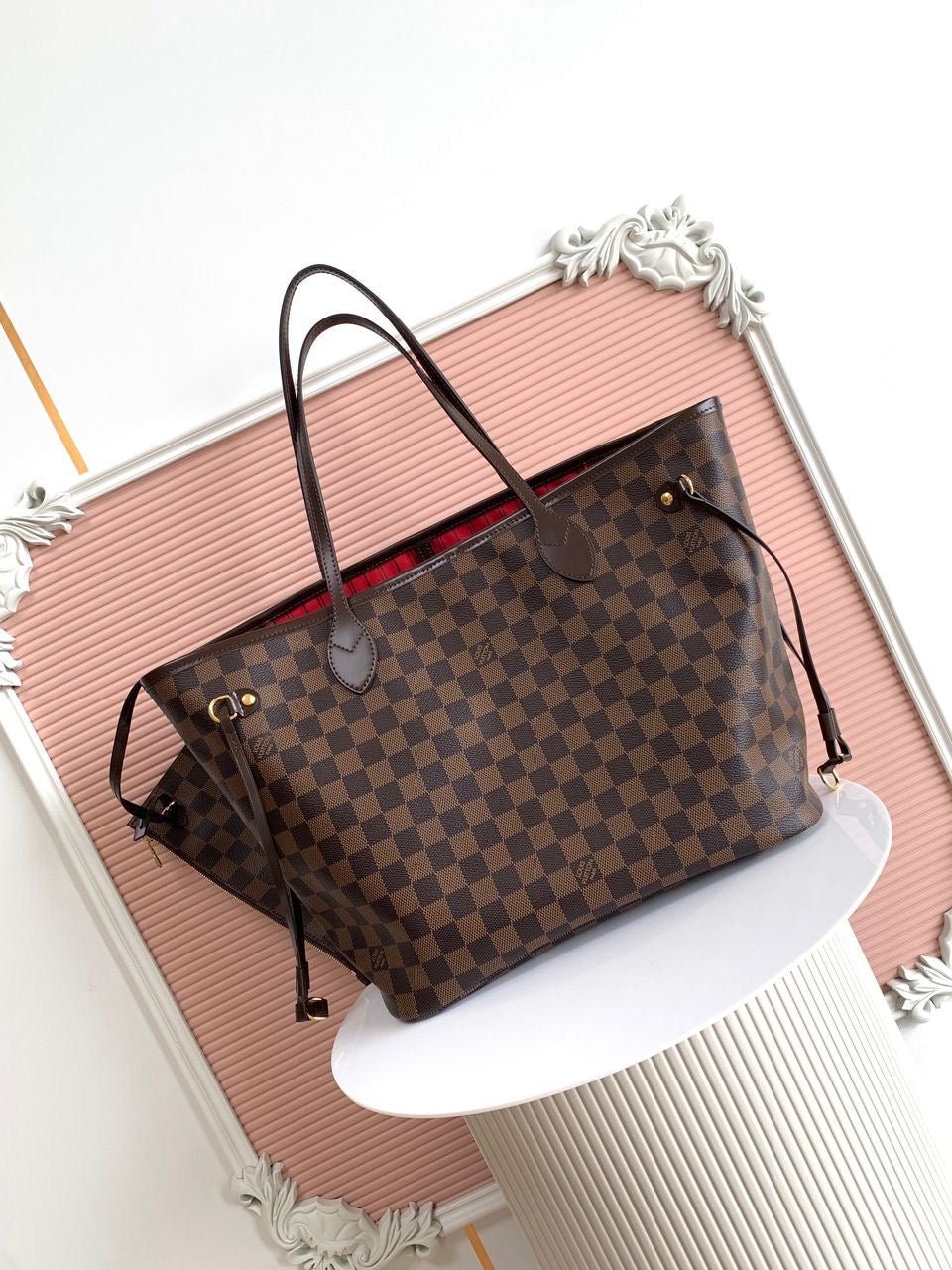 LV brown handbag with red inside