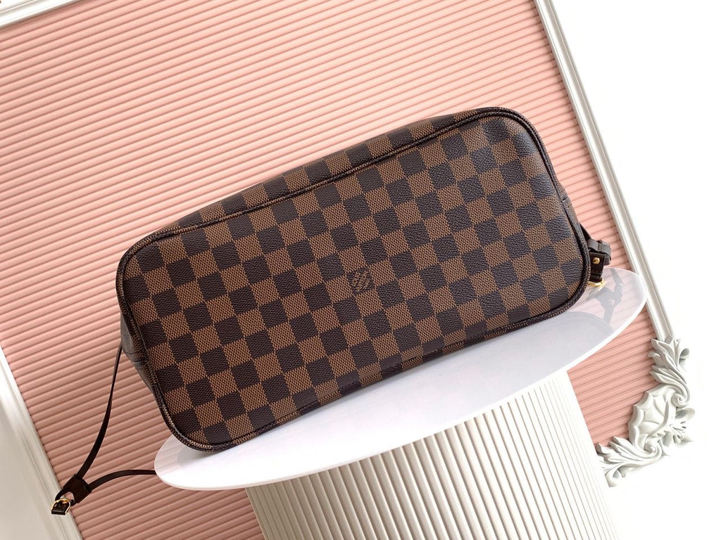 LV brown handbag with red inside