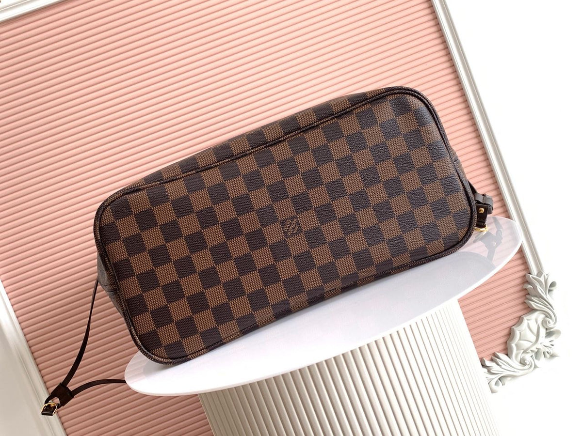 LV brown handbag with red inside